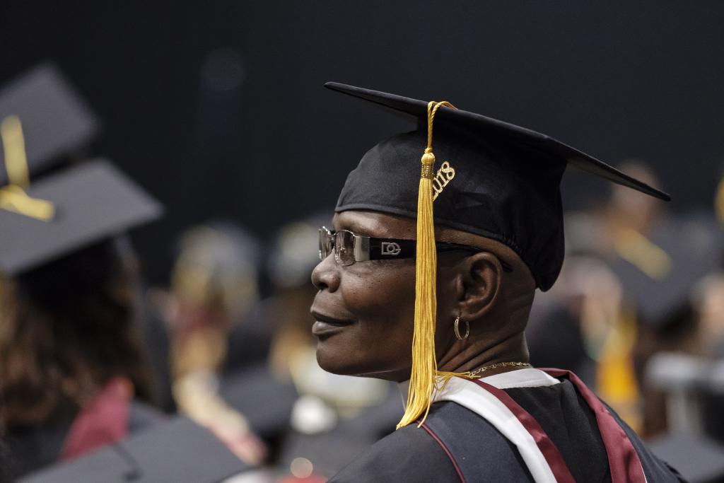 Adult student reflects at graduation