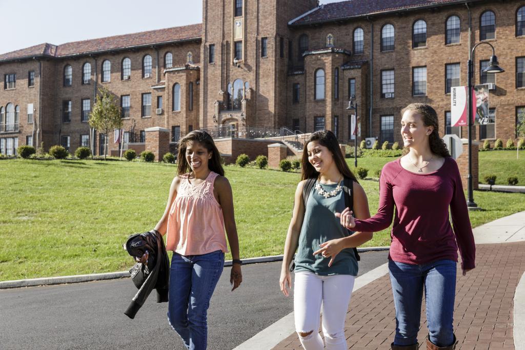 Students walk through Alvernia's campus.