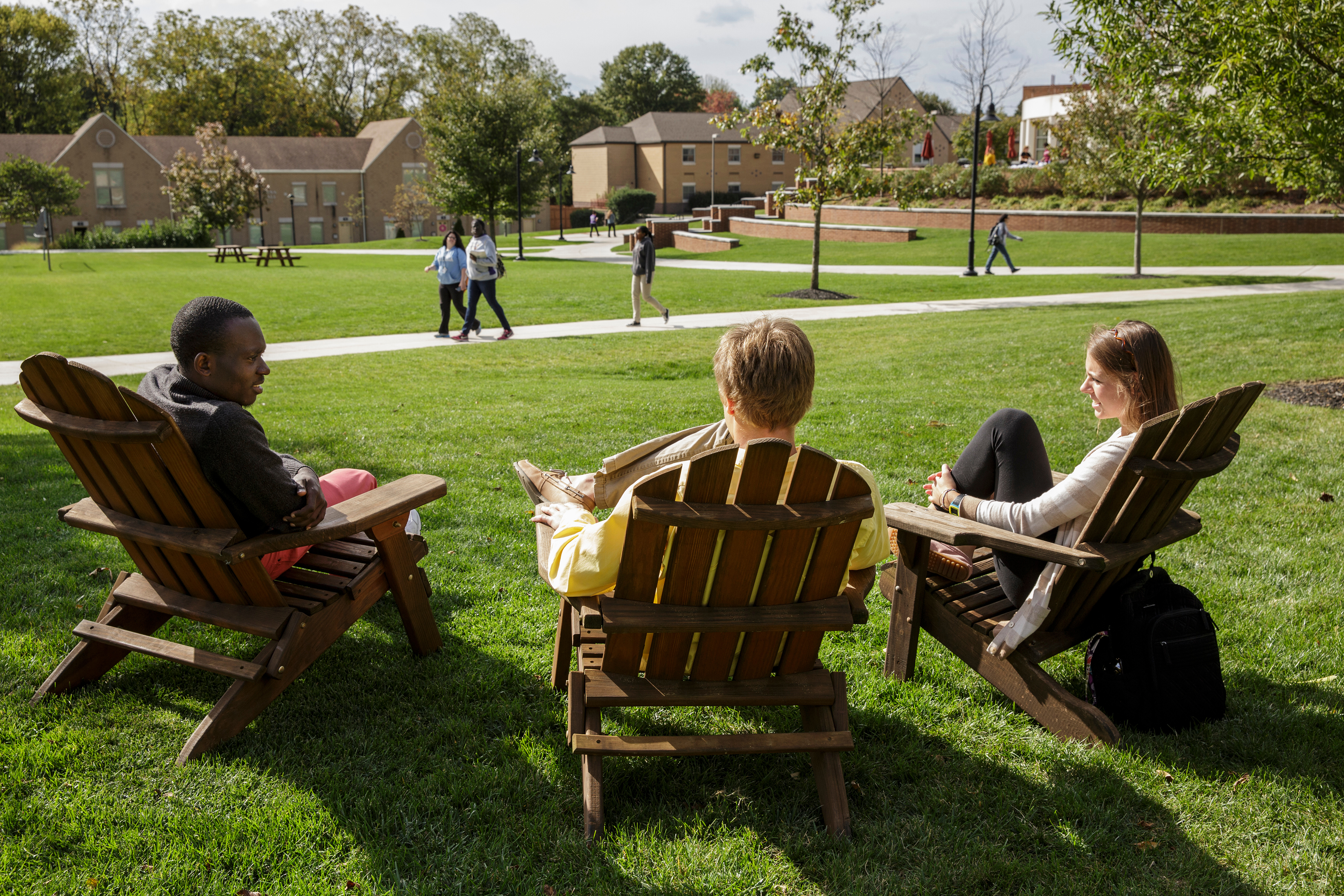 Students in Adirondack chairs