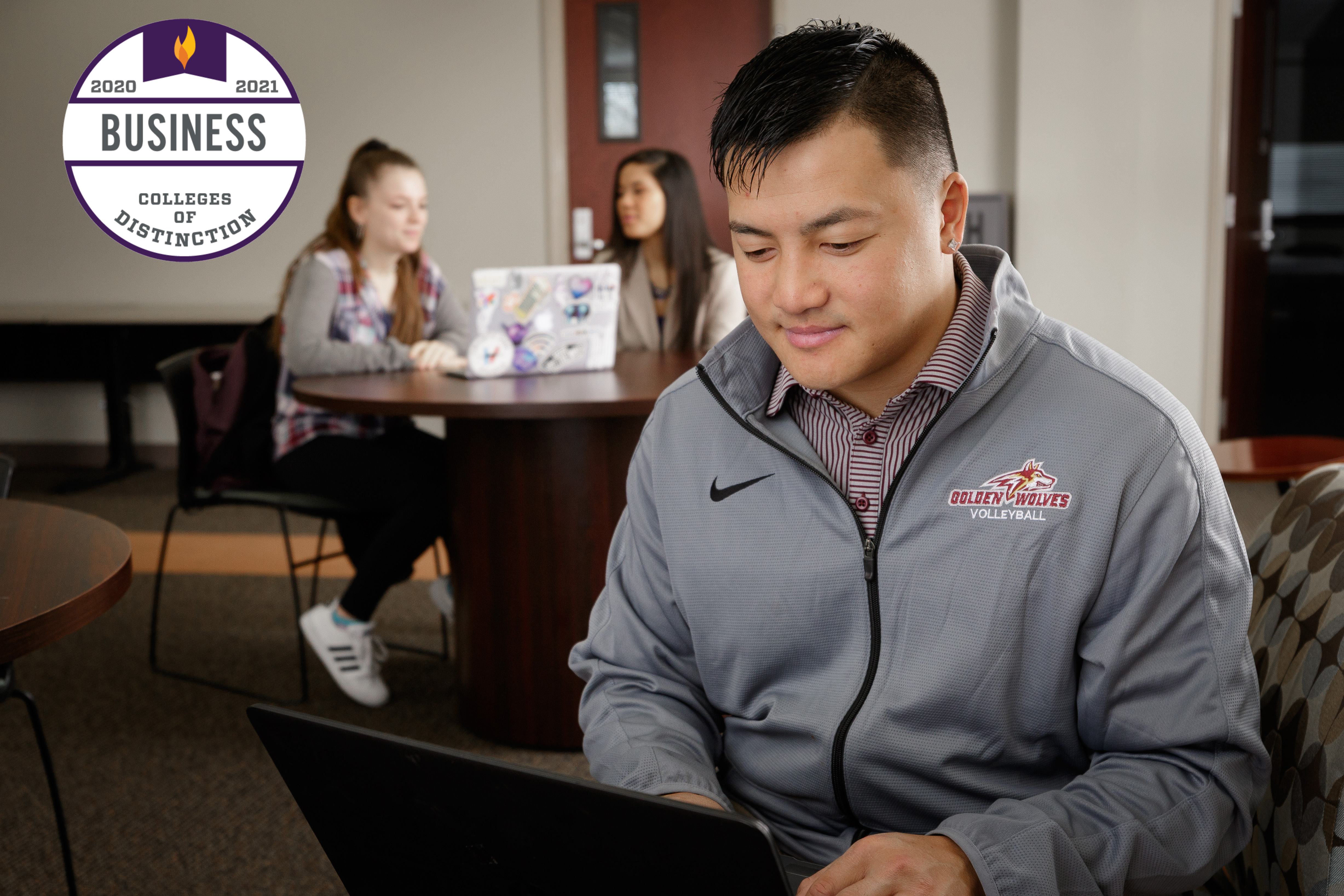 Business student working on laptop.