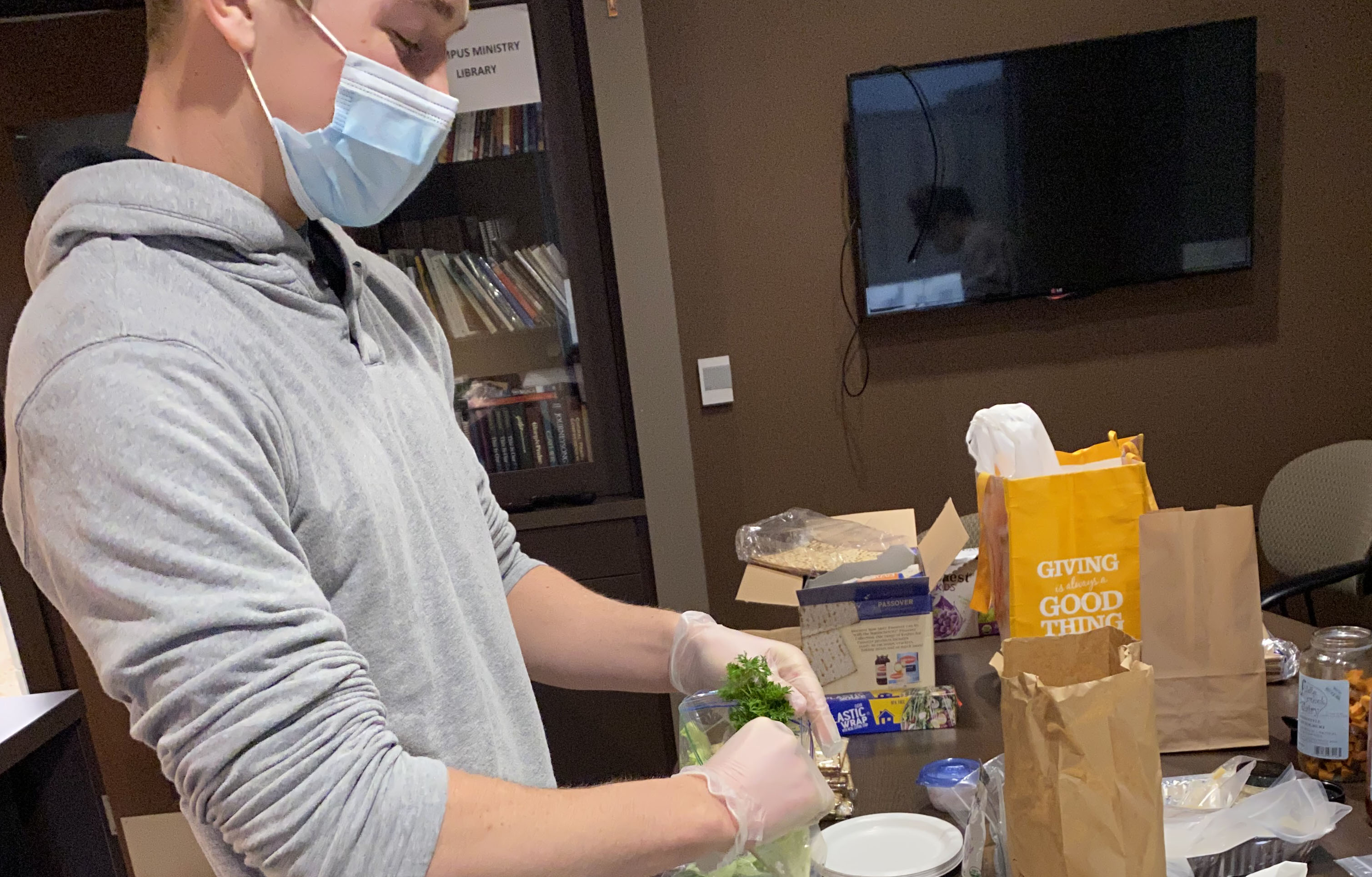 Student volunteering at Clare's Cupboard