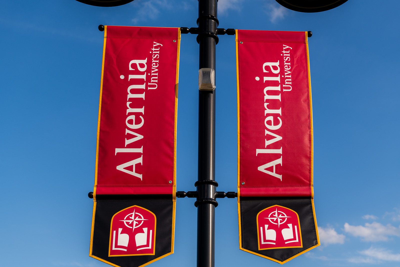 Banners hang throughout Alvernia University's campus.