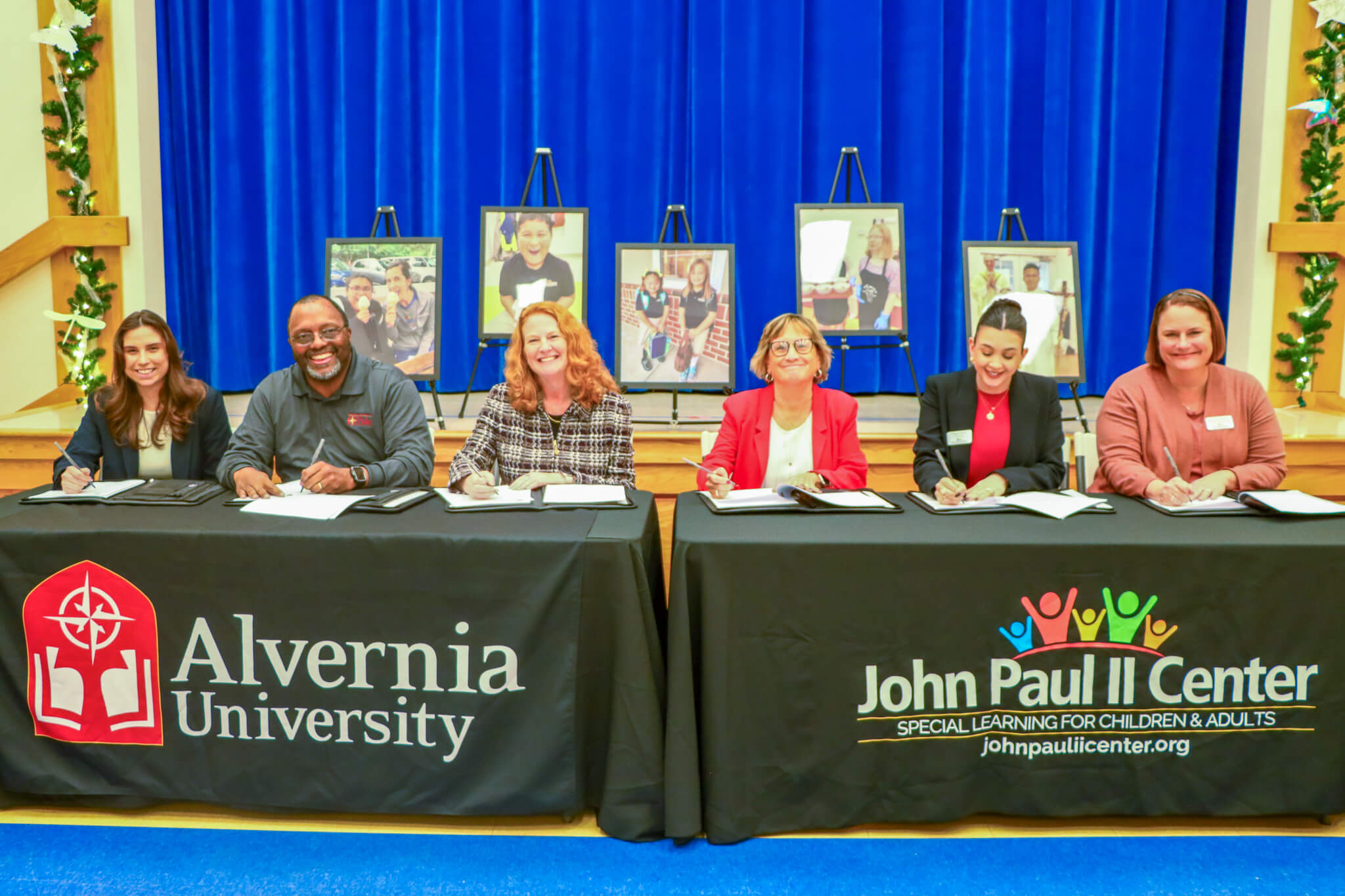 O’Pake Institute Director of Student Services Katie Hestor, Alvernia Vice President of Research, Economic Development and Strategic Initiatives, Rodney S. Ridley, Sr., Alvernia President Glynis A. Fitzgerald, Ph.D., Assistant Superintendent for the Diocese of Allentown Karen Rolston, John Paul II Center Principal Kaylee Simcik, John Paul II Center Transitions Program Coordinator Rene Berkhammer