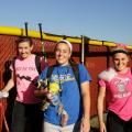 Softball players leave field