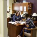 Staff member advises student