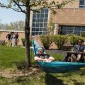 Student lounging in a hammock