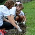 Students planting on service day
