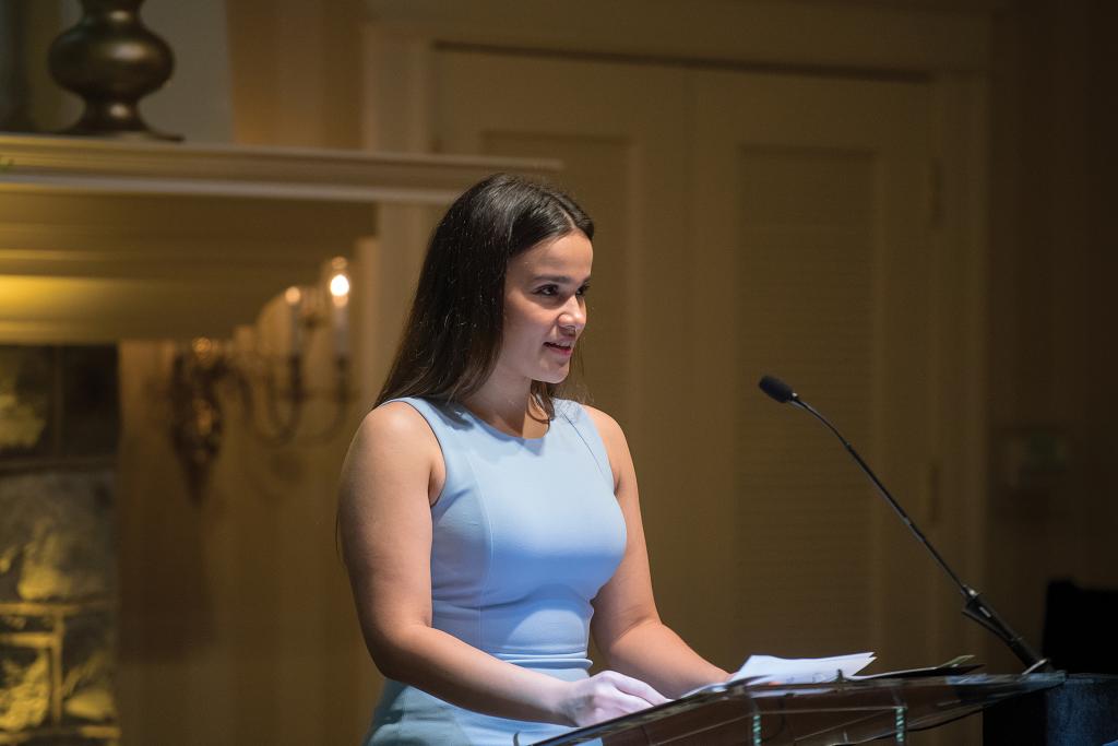 Syana Ortega speaking at podium