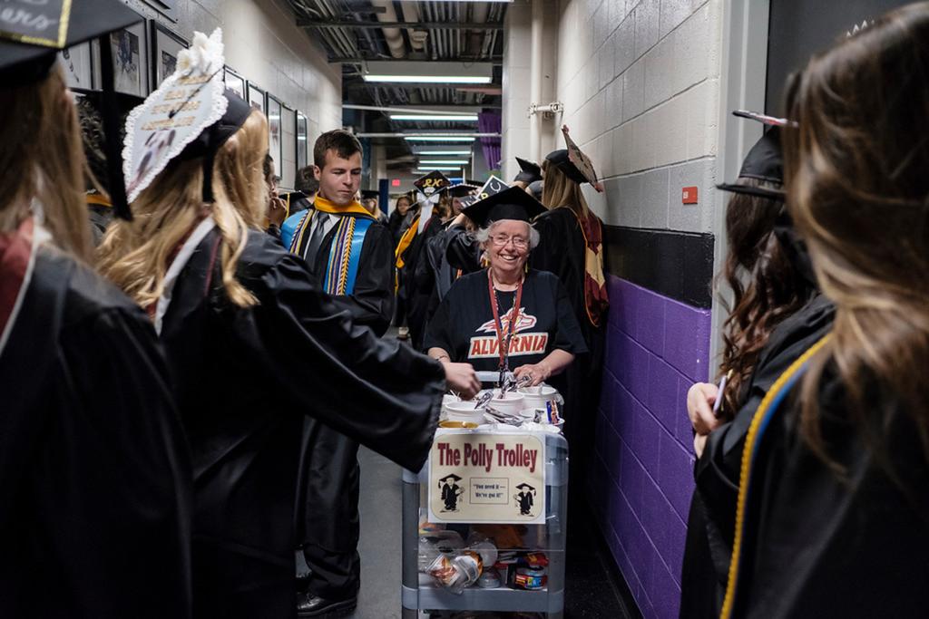 Polly Mathys wheels her "Polly Trolly" though graduation