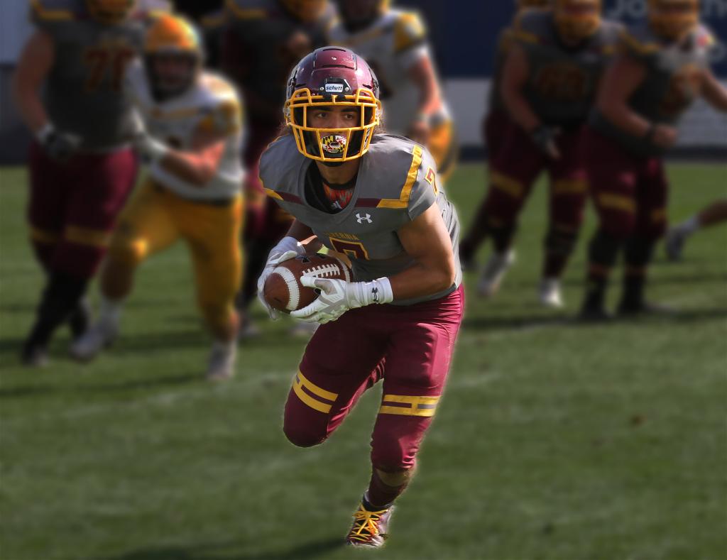 Alvernia Football Player with ball