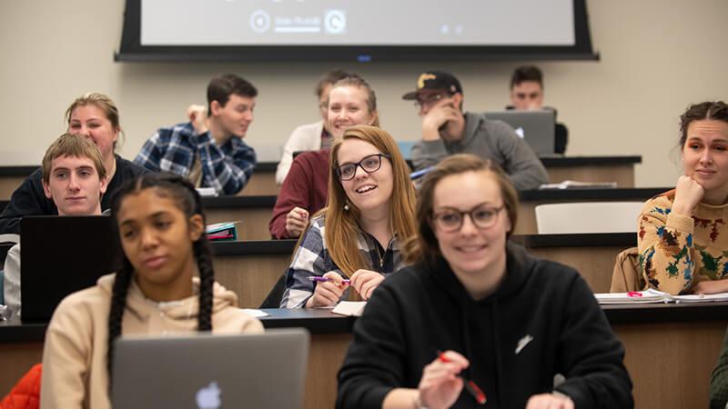 Alvernia students have a lighthearted moment in class.