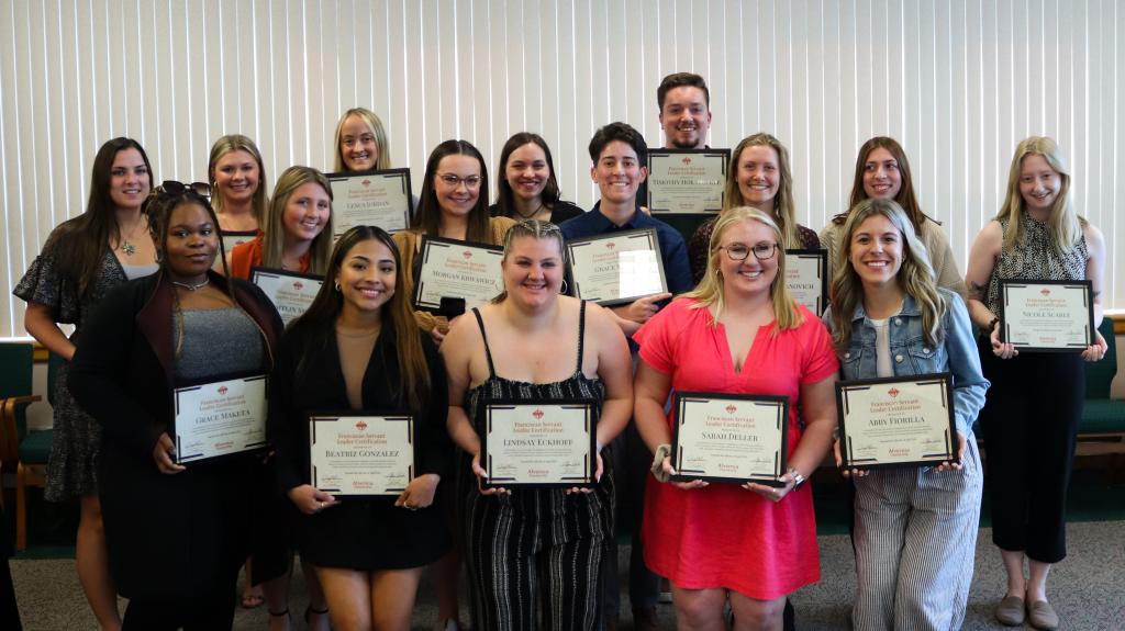 Holleran Center students with their awards.