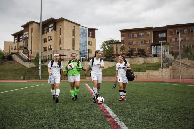 Soccer players on turf