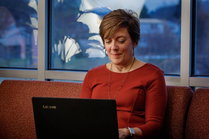 Female graduate student at laptop