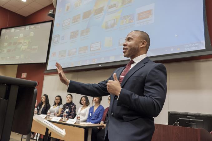 Eric Turman, principal of Reading High School, addresses students at forum.