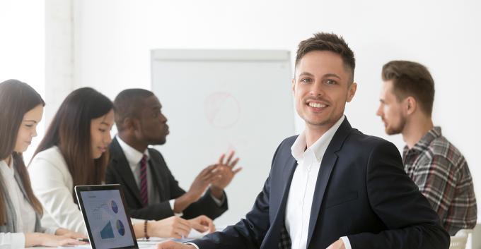 Smiling businessman business boardroom