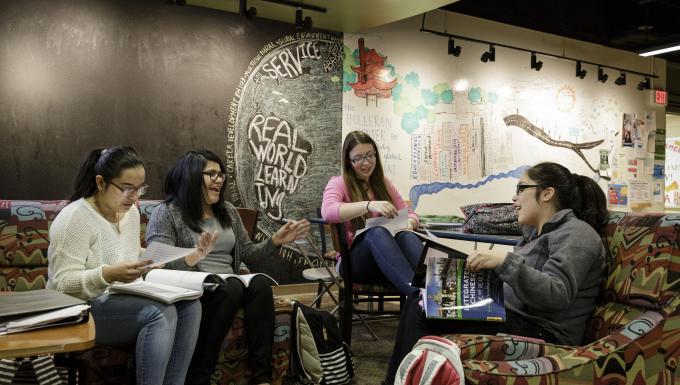 Female students study in Bernardine Hall Lounge