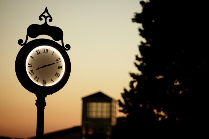 clock at sunset