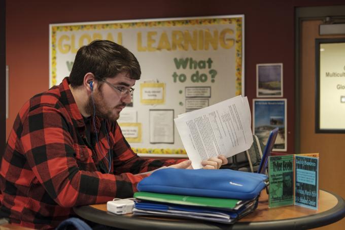 Student Studying in Berardine Hall Lounge