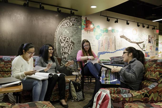 Female students study in Bernardine Hall Lounge