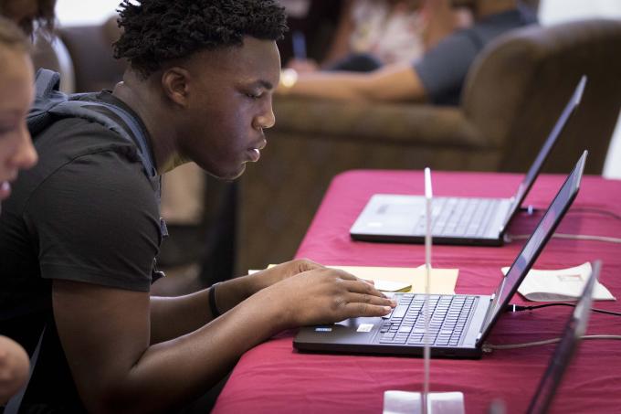 Student working at laptop