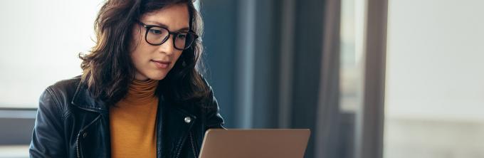 Female Adult Student at a Laptop