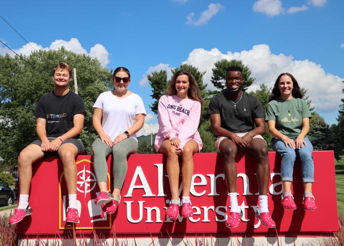 Students show off Alvernia's new Crocs.