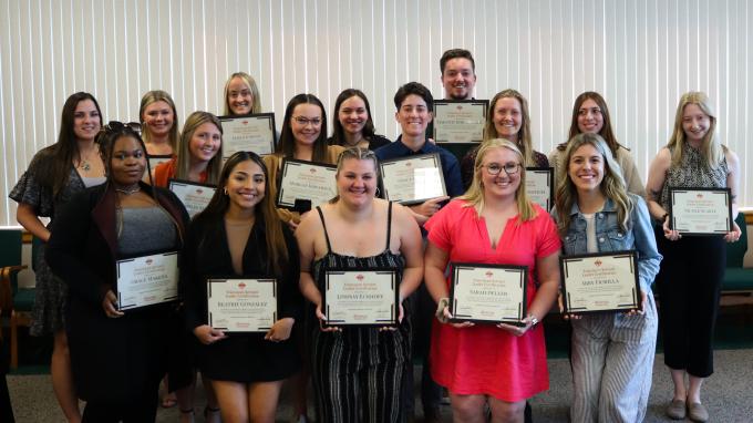 Holleran Center students with their awards.