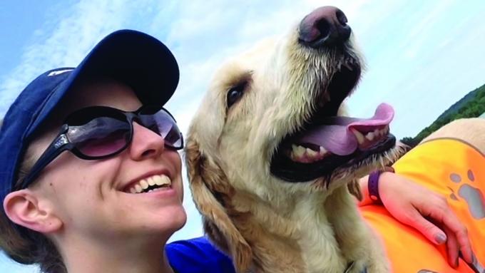 Alumna Camille Otruba with her dog Indy