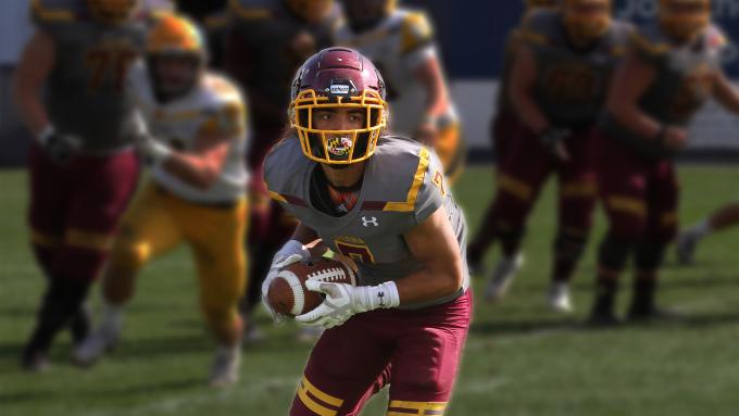 Alvernia Football Player with ball