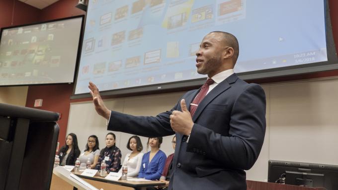 Eric Turman, principal of Reading High School, addresses students at forum.