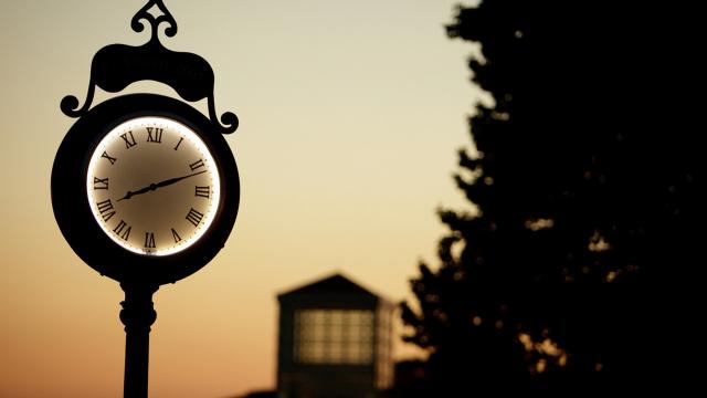 clock at sunset