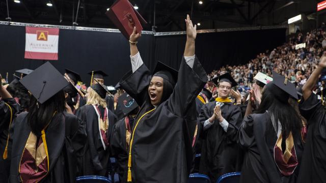 Student celebrates at graduation