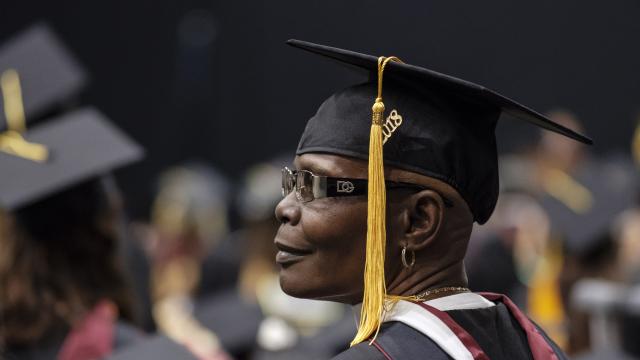Adult student reflects at graduation