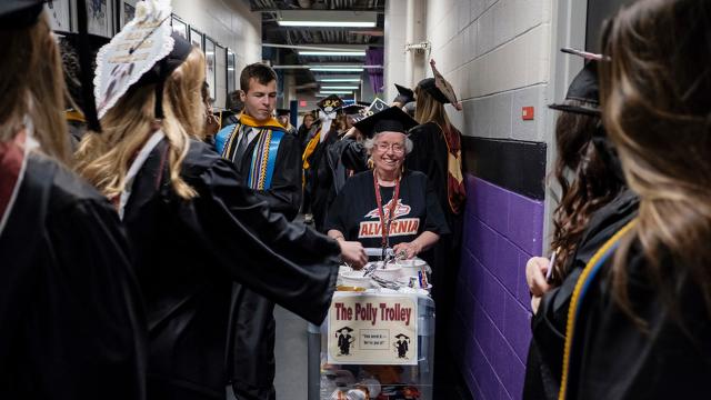Polly Mathys wheels her "Polly Trolly" though graduation