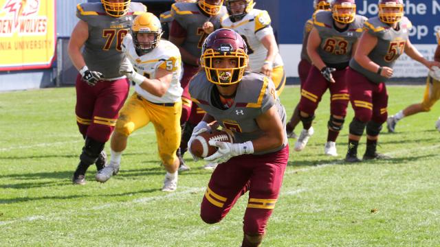 Alvernia Football Player with ball