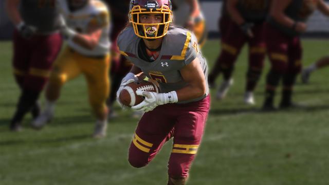 Alvernia Football Player with ball