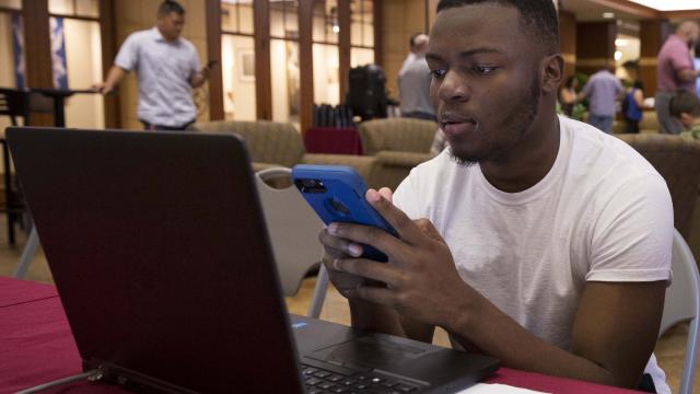 Male student at laptop