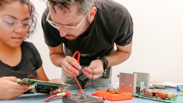 Electrical Engineering Student Working with Professor