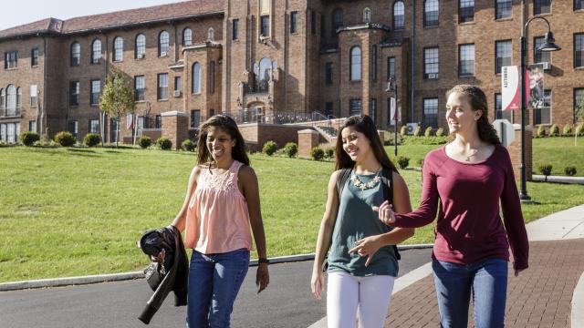 Students walk through Alvernia's campus.