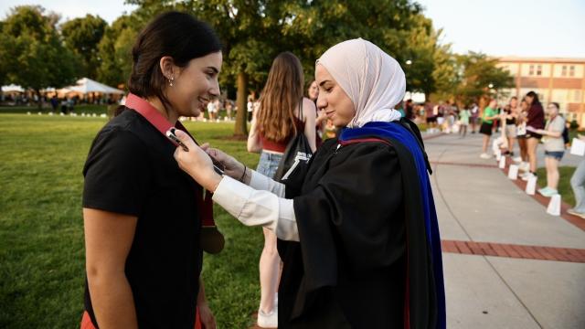 Alvernia University Luminary Ceremony Medallion Presentation